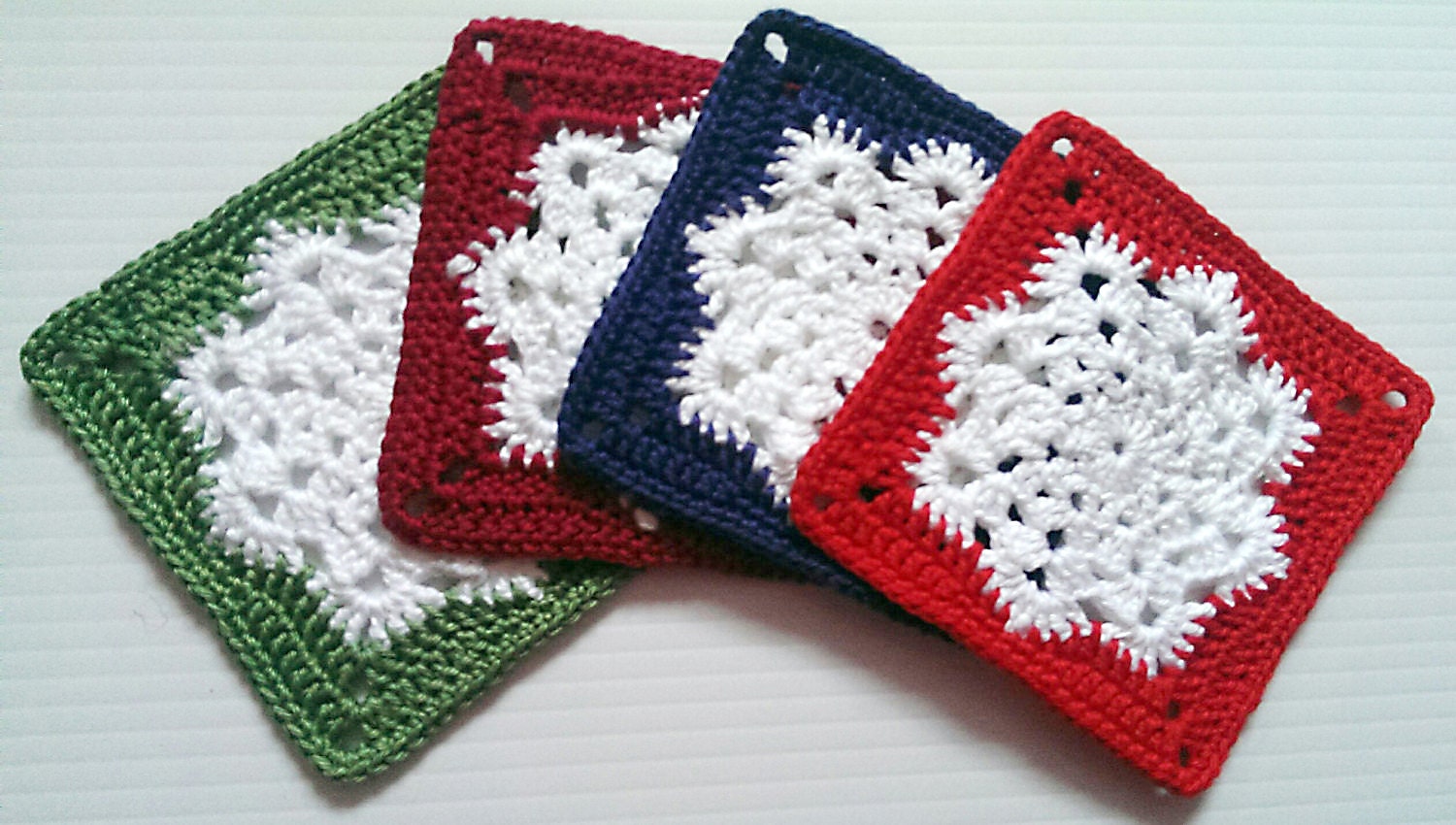 Crocheted snowflake coasters for Christmas crochet coasters