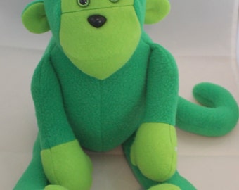 green stuffed monkey