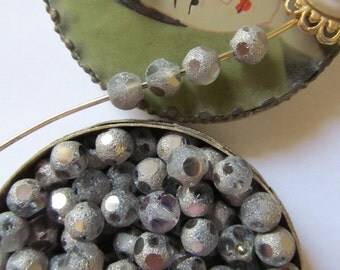 50 Unusual Polka Dotted Gunmetal Glass Beads