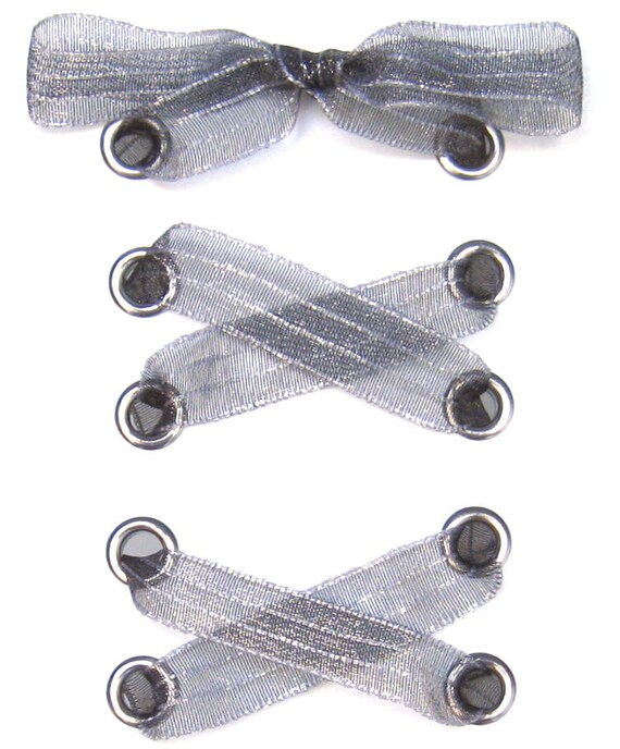 black shoelaces with silver tips