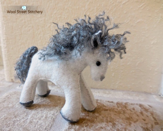 white pony soft toy