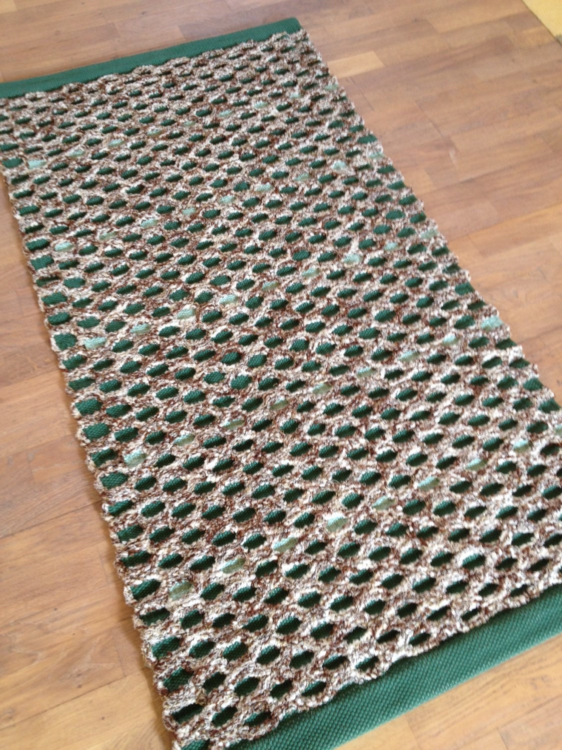 Green and brown rug. Light mint stripes. Bedroom rug. Thick