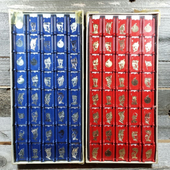 full set of red and blue vintage stratego board game pieces