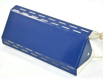 Vintage bed light or night lamp in retro style from the 1980s