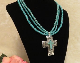 SALE !!! Three Strand Turquoise Necklace w/ Embossed Cross Within A Cross Silver Pendant.