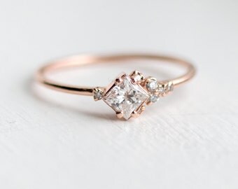 In the Sky with Diamonds Ring // Princess cut diamond ring with asymmetrical side diamonds in 14k Gold / Delicate diamond engagement ring