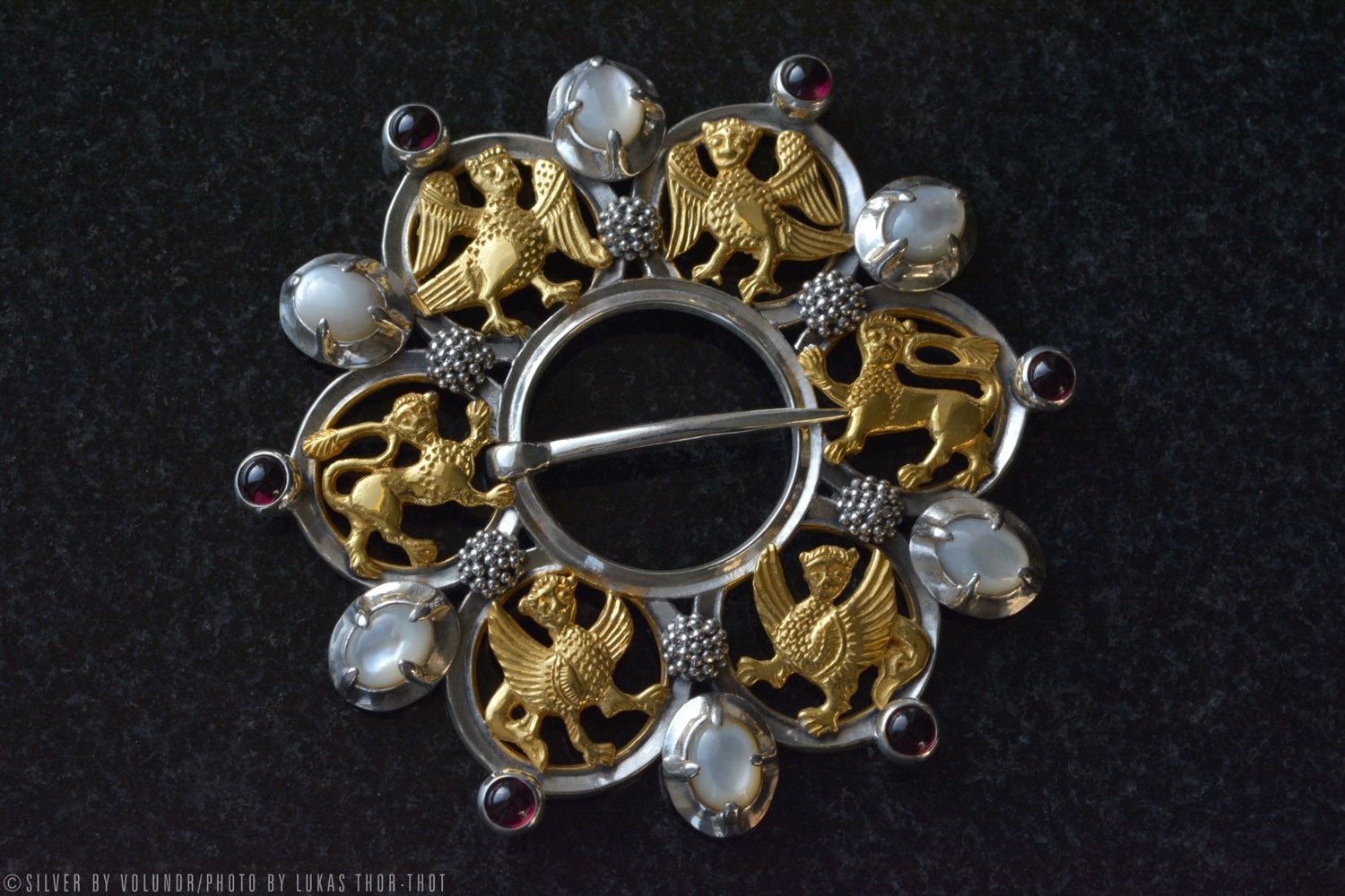 Rich medieval brooch