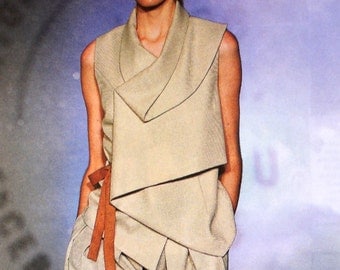 Beige vest-top with folded collar and hem