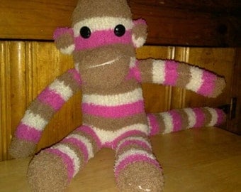 pink striped sock monkey