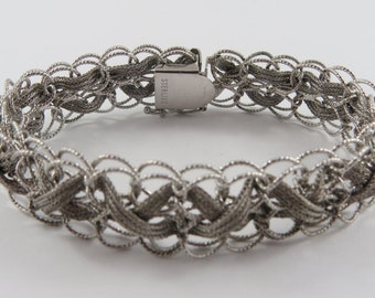 Items similar to Woven Silver and Leather Bracelet on Etsy