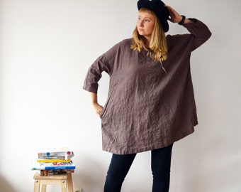 Black Oversized T Shirt Dress with Baseball Cap The Maribel shirt dress in grey, with it's playful print, is a contemporary take on the classic shirt dress. Cut to an oversized silhouette in a luxurious satin, this is femininity done the modern way.