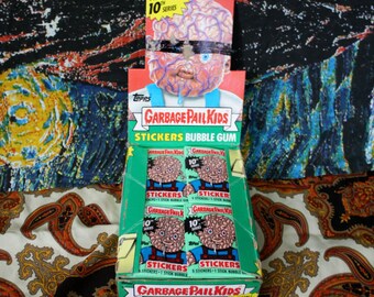 Garbage Pail Kids Vintage Trading Cards. One Pack Of 10th Series 1980s Garbage Pail Kid Sticker Trading Cards.