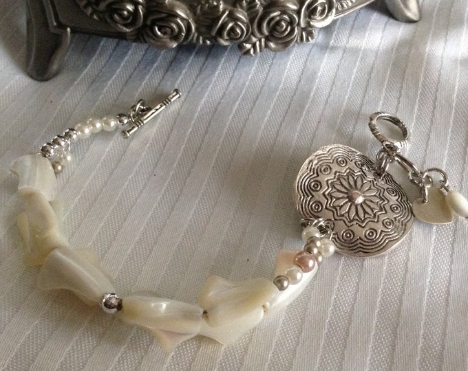 White Mother of Pearl Silver Disc Bracelet...Toggle clasp with charms