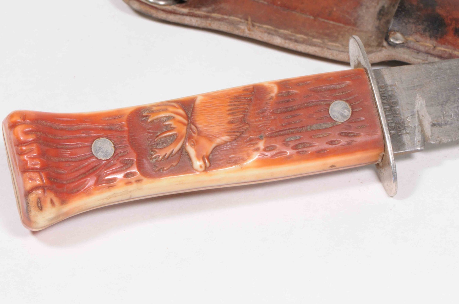 Vintage Imperial fixed blade hunting knife with elk design