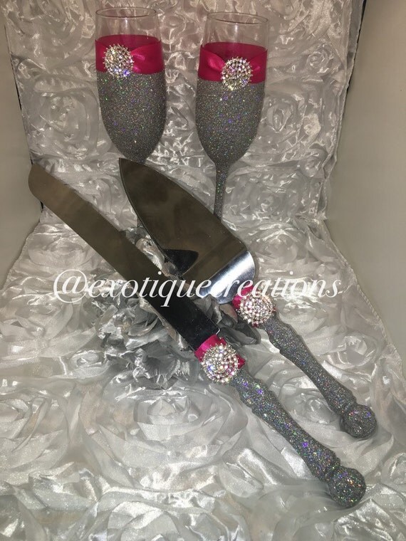 Silver Bling  and Fuschia Toasting Flutes and Cake  