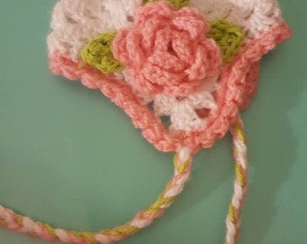 Baby hat with ear flaps and flower