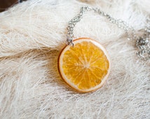 Popular items for orange necklace on Etsy