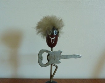 Former musician bottle opener, 1970s vintage