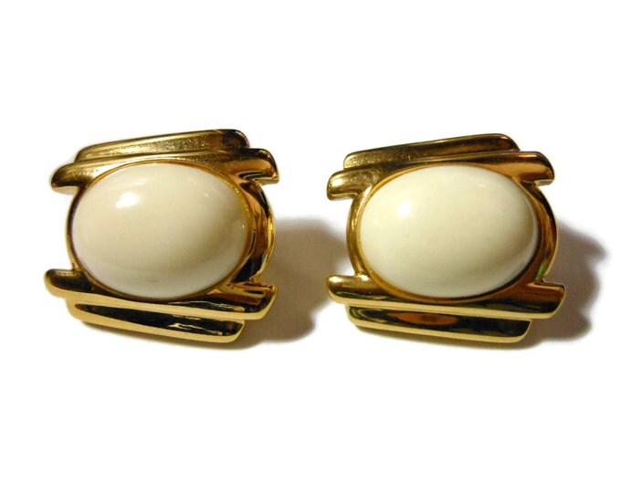 Trifari 1980S earrings, creamy white lucite cabochon, gold columns on sides, clip earring, off white, winter white