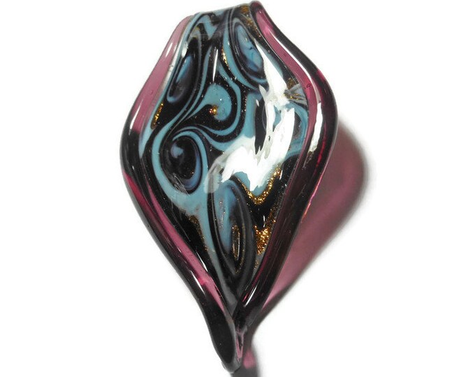 Large lampwork pendant, dramatic blue and black swirls with gold glitter highlights and purple edging, turning leaf shape, 70 mm X 40 mm