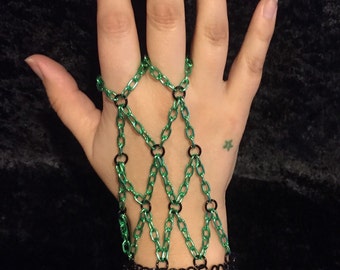 Green and black chainmail handflower