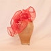 Beautiful handmade hot pink frill ladies side hat decorated with delicate beading