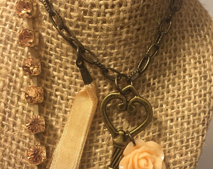 Cream colored skeleton key necklace