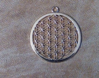 Gold toned sacred geometry flower of life pendant.bjewelry supplies. Flower of life.