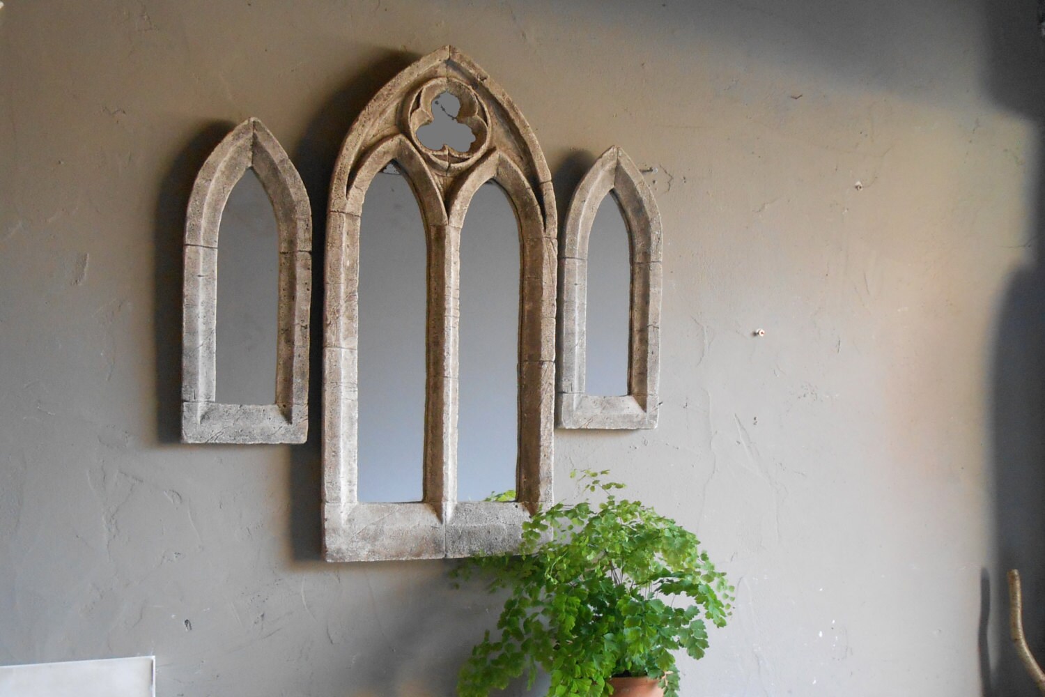 A trio of gothic mirrorsantique church window arrangement for
