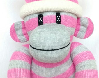 pink striped sock monkey