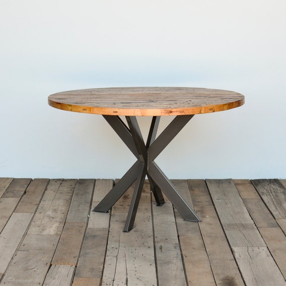 Round dining table in reclaimed wood and steel legs in your