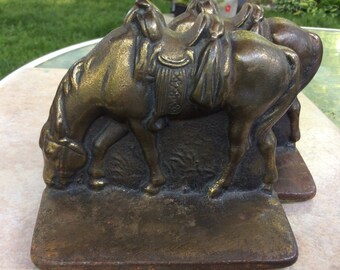 Cast Iron Saddled Grazing Horses Bookends signed '6 8'