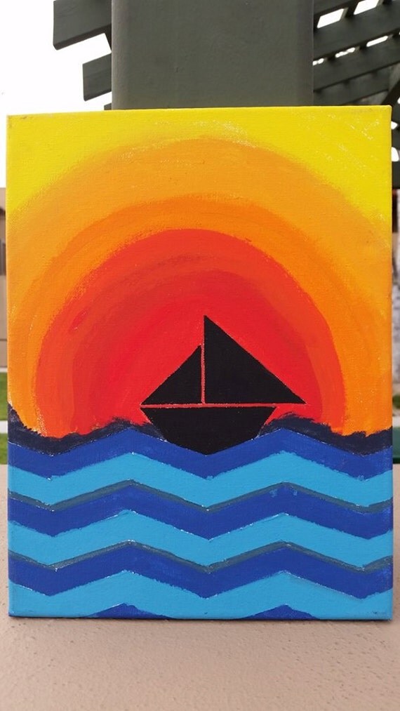 Black Tangram Boat Sailing in a Blue Sea With an Orange Sunset