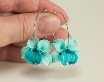 Orchid Earrings. Turquoise flower earrings. Tropical Flower hoops earrings. Polymer clay jewelry. Teal Earrings. Hoop earrings. Teal Jewelry
