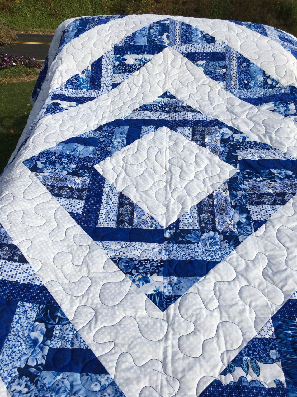 Blue and white handsewn queen size quilt