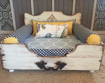 Optional log roll pillows for dog beds.