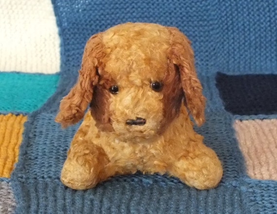 stuffed toy dog with puppies inside