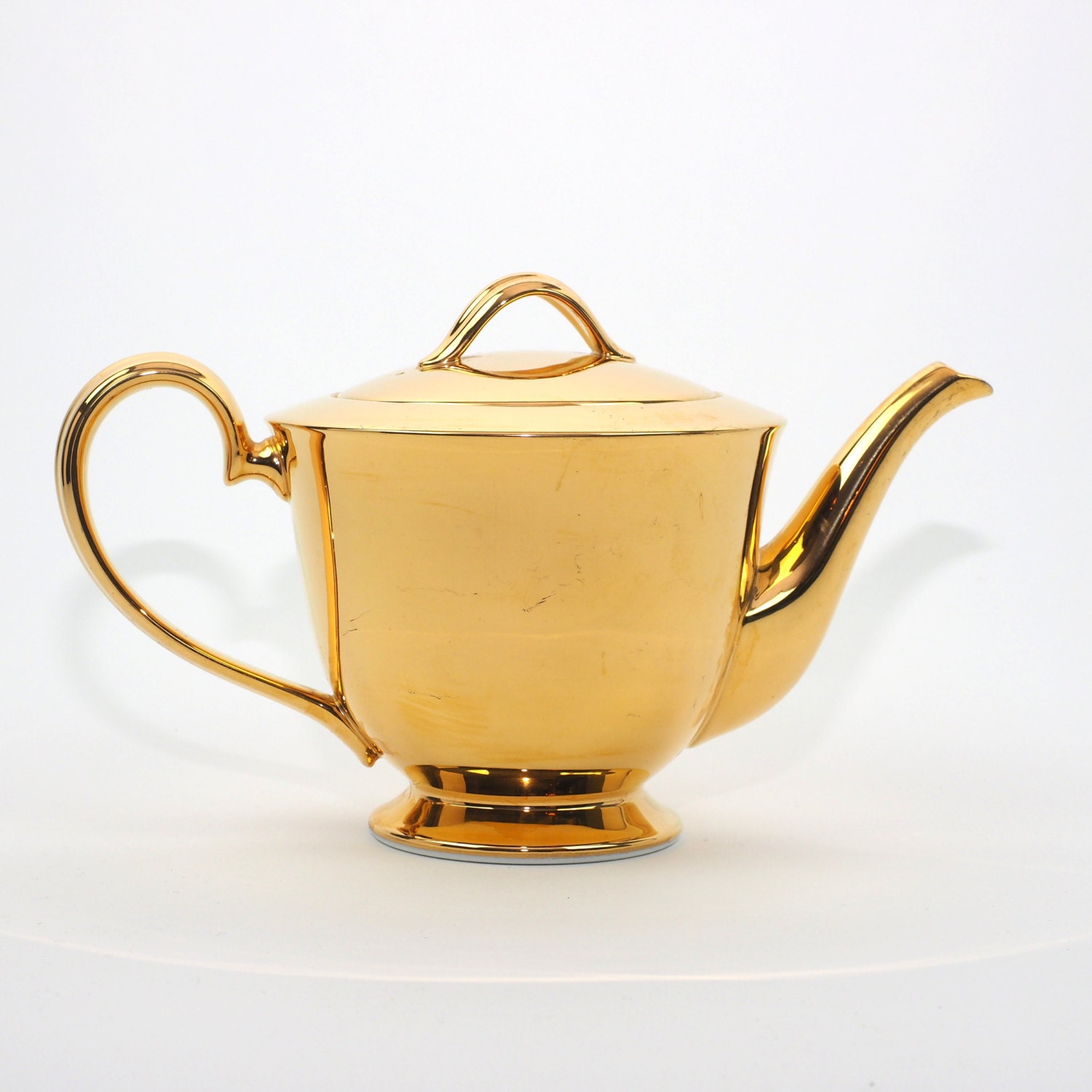 Noritake Teapot with Solid Gold Toned Overlay White