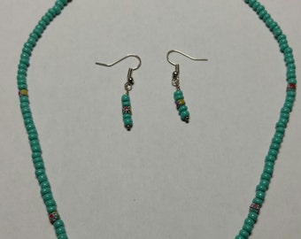 Simple blue beaded necklace and earrings