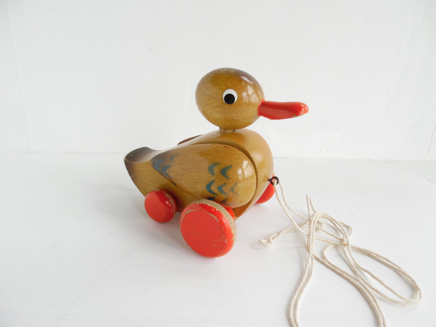 Vintage wooden pull along duck toy moving head and wings
