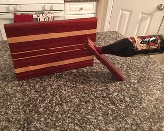 Cheese cutting board and wine holder