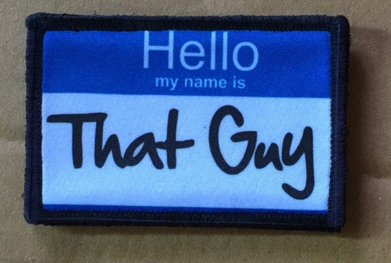 blue shirt guy name tag