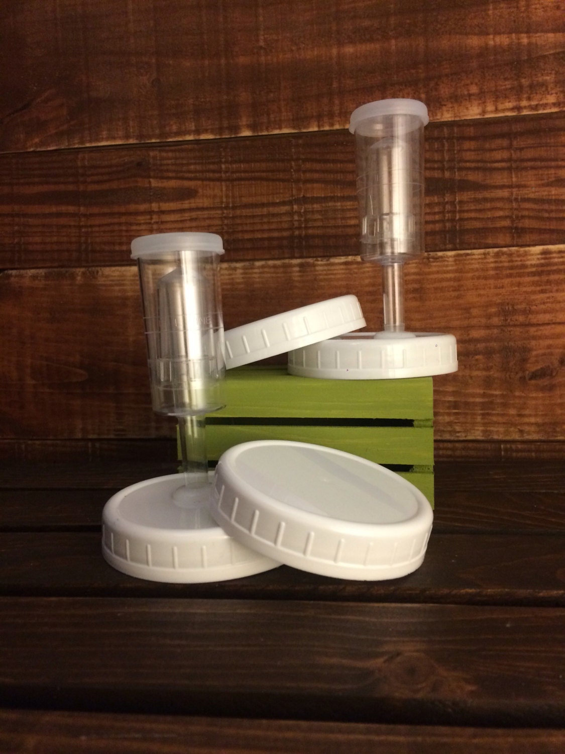 Two airlock fermentation lids with leak proof storage lid for