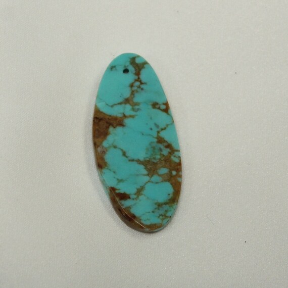 Stabilized turquoise drilled 35x16mm