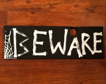 Items similar to Beware.. Halloween Wood Sign on Etsy