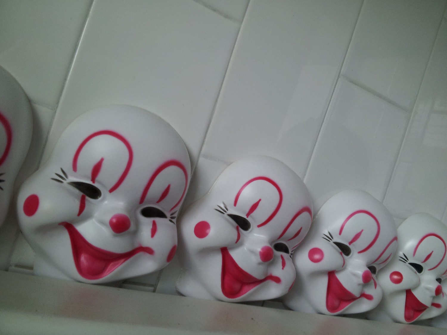 Vintage Plastic Clown Face Mask Heads from Bizzard on Etsy Studio