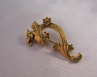 Vintage MMA. Metropolitan Museum of Art Gold Plated Mytical Winged Dragon Brooch
