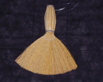toy straw broom