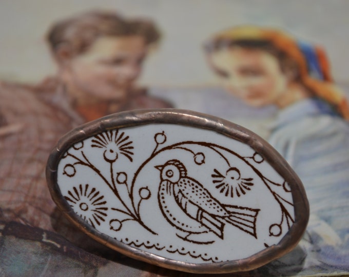 Porcelain ring from the piece of soviet plate with cute bird on it