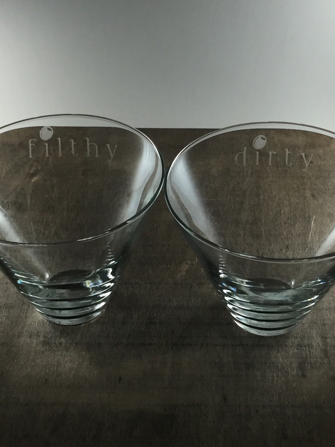 Set of etched stemless martini glasses dirty & filthy
